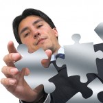 bigstock-Business-Man-Arranging-Puzzle--456424 Project management a piece at a time